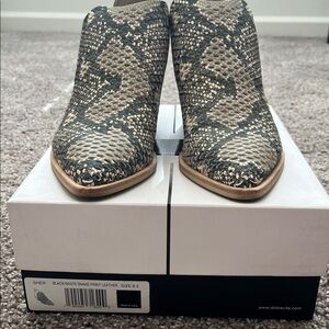 Dolce Vita Snake Print Booties in Black and Cream